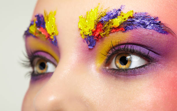 istock Close-up female portrait with unusual face art make-up. 1368389598