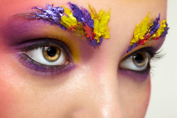 istock Close-up female portrait with unusual face art make-up. 1368389607
