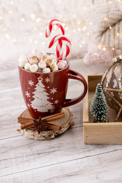 istock Christmas candy cane heart shape, bokeh background. 1368391636