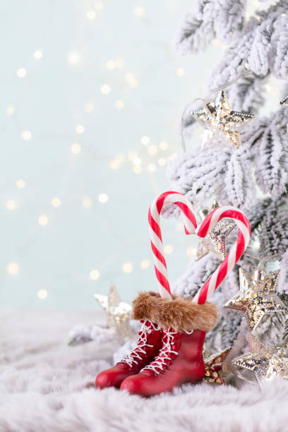 istock Christmas candy cane heart, bokeh background. 1368391841