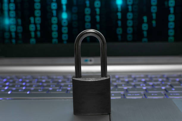 istock Lock on laptop as computer protection and cyber safety concept. Private data protection from hacker malware 1368392552