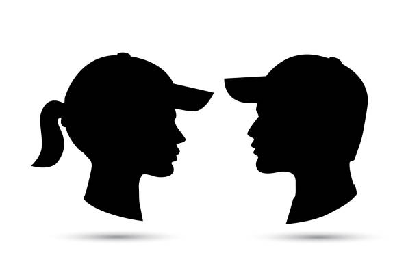 Man and woman wearing baseball cap vector Man and woman wearing baseball cap vector icon isolated on white sideways baseball hat stock illustrations