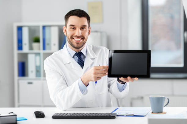 doctor with tablet pc having video call at clinic