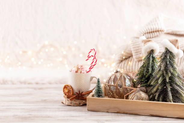 istock Cup with a hot drink, marshmallow on a table with christmas decorations. 1368395717