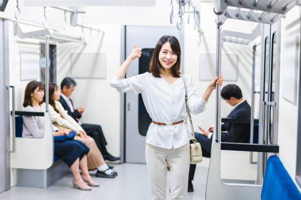 istock Young woman pointing at a point on the train 1368396208