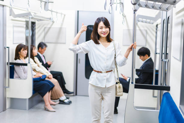 istock Young woman pointing at a point on the train 1368396209