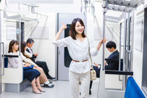 istock Young woman pointing at a point on the train 1368396217