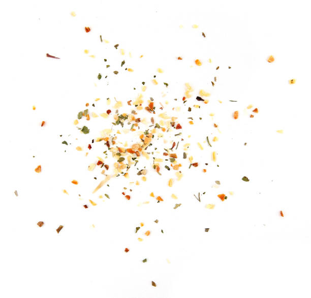 istock A mixture of different spices and herbs isolated on white background. 1368396260