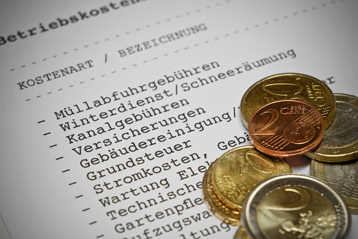 Betriebskostenabrechnung (german language) - Statement of operating costs with Euro coins. For your information: The statement of operating costs has been designed and printed by myself. No problems with copyright.