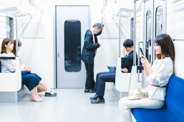 istock A young woman using her smartphone on the train 1368397406