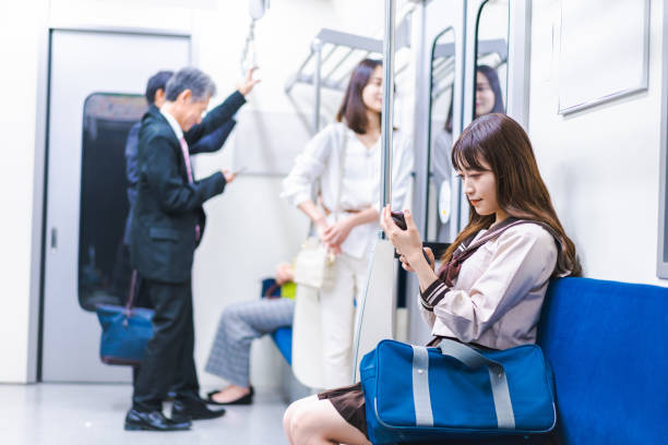 istock High school girls commuting to school by train 1368399042