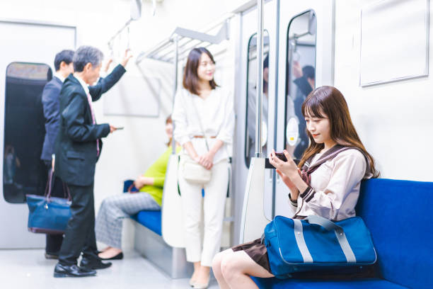 istock High school girls commuting to school by train 1368399056