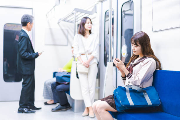 istock High school girls commuting to school by train 1368399057