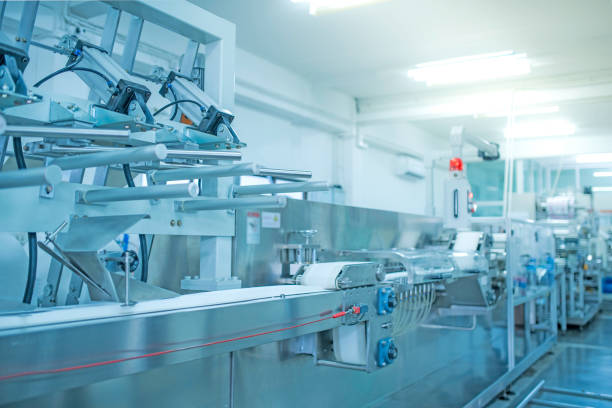 istock factory, industrial area, automation, technology, Machines for packing products Within the factory, sterile beauty industry in order to maintain maximum cleanliness.shallow focus effect. 1368404420