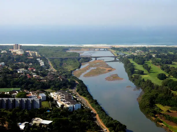 The image was taken in Durban, South Africa on May 24, 2021. It is an aerial view of the Umgeni River Estuary.