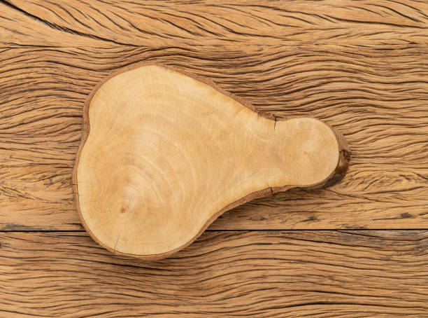 istock Empty rustic wooden board over wooden table with copy space 1368406719