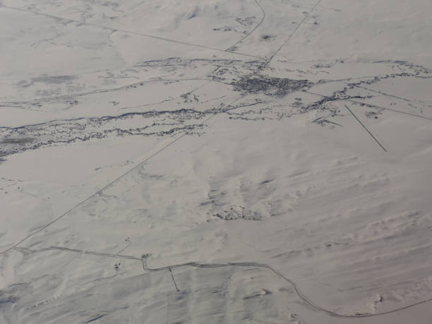 istock Town below, snowy landscape 1368410320