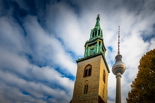 TV Tower and St. Mary Church at Alexanderplatz in Berlin