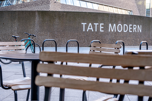 London England UK, 29 January 2022, Tate Modern Sign Painted On Wall With Outside Seating And No People