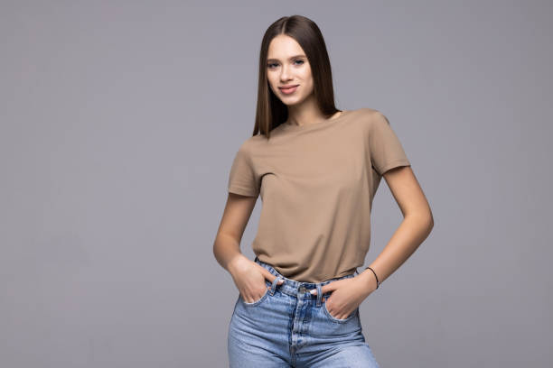 istock Beautiful young woman isolated on grey background 1368414327