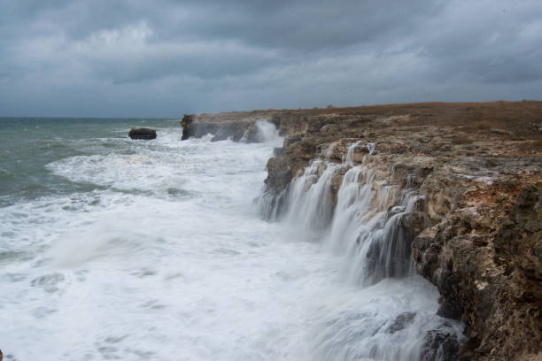 istock Dramatic seascape with rocks and waves - copy space 1368415631