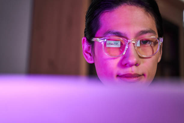 istock Asian man browsing Meta Platforms site at his laptop while sitting at the room 1368415943