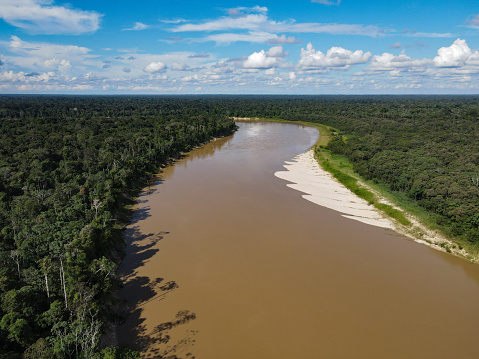 Rain forest and Itaquai River in Amazona Brazil. Large River that carries indigenous Amazon tribal people to frontier cities.  Near Atalaia do Norte