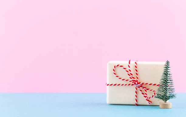 istock Christmas gift boxes on pastel background. 1368419053