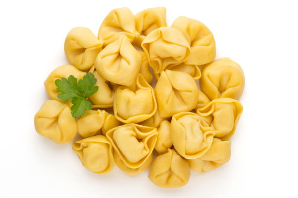 istock Raw homemade pasta,tortellini with herbs. 1368420433