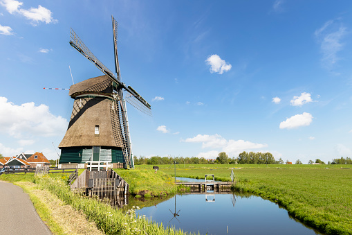 Windmill de Kathammer near the touristic fishing village of Volendam in the Netherlands.