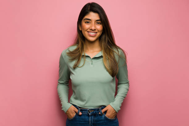 istock Gorgeous woman against a pink background 1368422939
