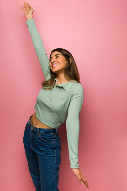 istock Cheerful woman having fun 1368424409