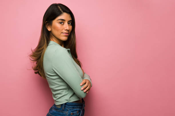 istock Confident woman with folded arms 1368424565