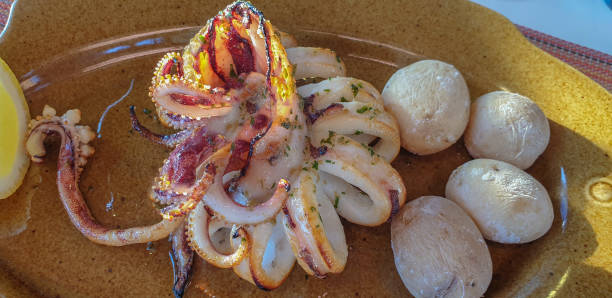 istock Baked octopus with potato 1368425740