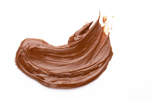 istock Chocolate cream isolated on white background. Flat lay. 1368427404