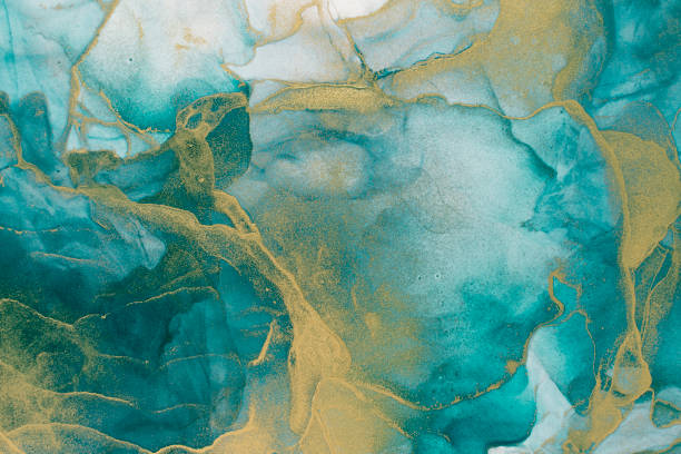 istock Rich bright abstract picture. Luxury abstract fluid art painting alcohol ink. Background blue green gold sparkles. 1368428259