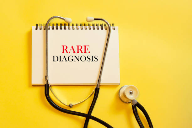 RARE DIAGNOSIS - in the diary of a doctor with a stethoscope RARE DIAGNOSIS - in the diary of a doctor with a stethoscope endangered species stock pictures, royalty-free photos & images