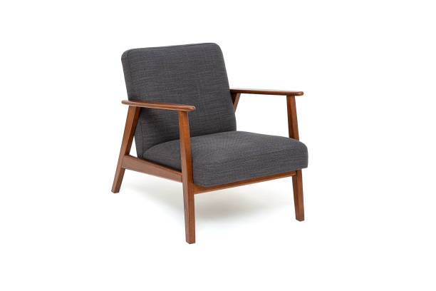 Vintage arm chair with wood armrests Vintage arm chair with wood armrests, armchair with solid wood frame construction on white background couch arm rest stock pictures, royalty-free photos & images
