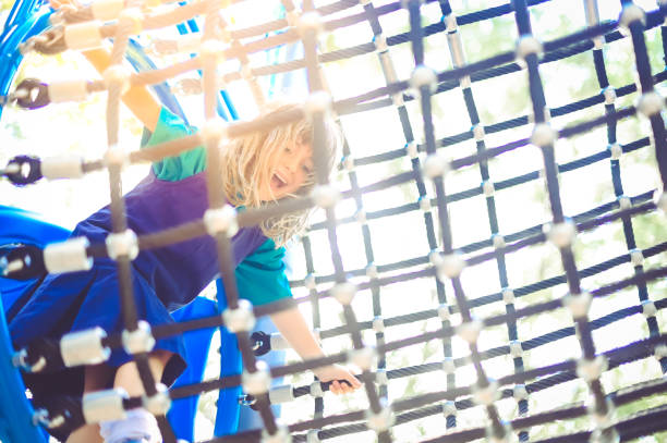 istock Child in school uniform on a playground outdoors for recess 1368432522