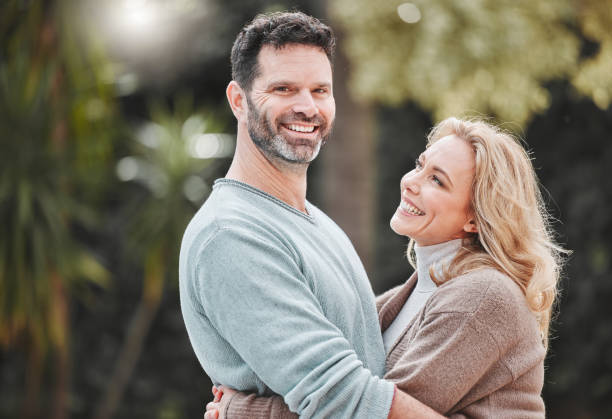 istock Shot of an affectionate mature couple standing outside 1368432634