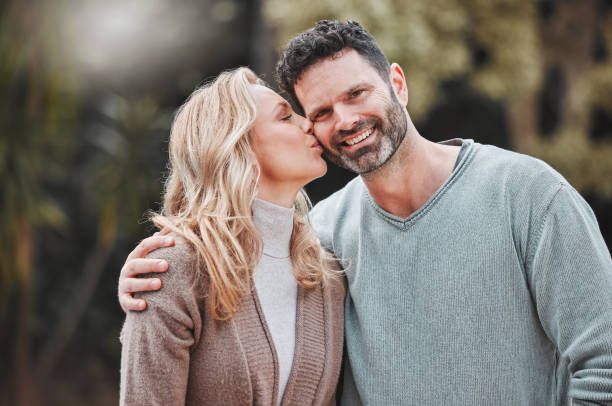 istock Shot of an affectionate mature couple standing outside 1368432647