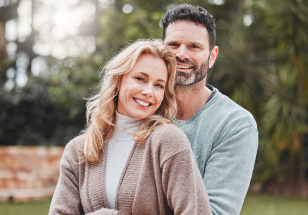 istock Shot of an affectionate mature couple standing outside 1368432664