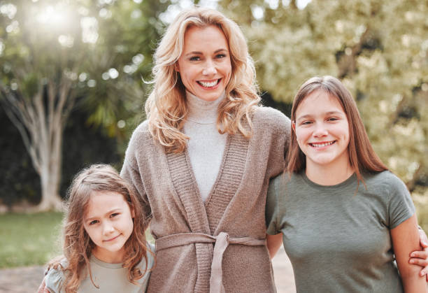 istock Shot of a woman spending time outdoors with her two daughters 1368432683