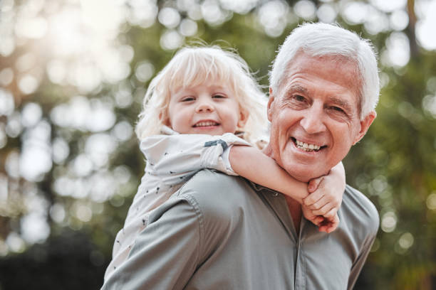 istock Shot of an elderly man spending time outdoors with his grandson 1368432713