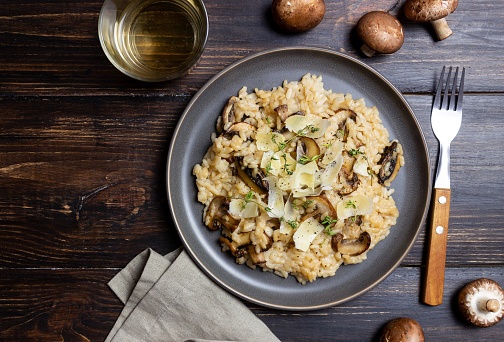 Risotto with mushrooms, cheese and thyme. Vegetarian food. Italian food
