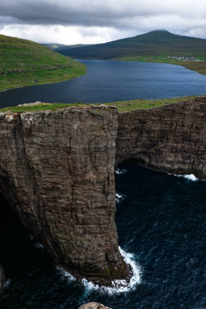 Faroe Islands The Faroe Islands have amazing green landscapes, impressive cliffs, cute puffing and lots of sheep mykines faroe islands photos stock pictures, royalty-free photos & images