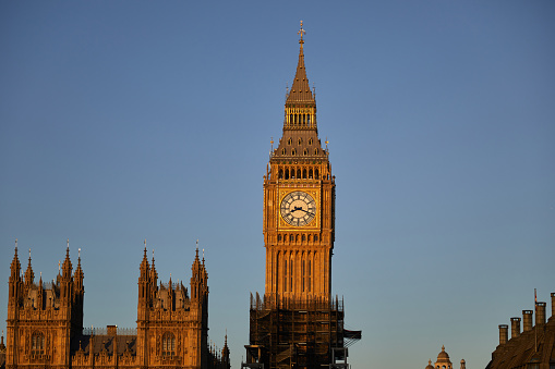 Big Ben at dawn from the south bank of the river Thames, golden hour