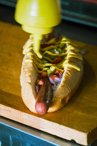 istock Hotdogs in making. Close up. 1368437716