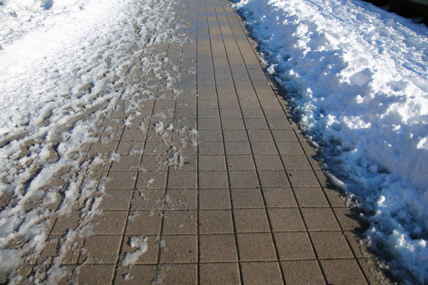 istock The squared tiles of a concrete walkaway 1368438543