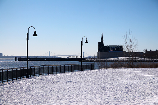 The Central Railroad of New Jersey Terminal and Verrazzano bridge with the snow in a winter day from Jersey City